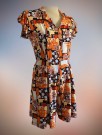 Oransje blomstrete jumpsuit str S/M thumbnail