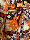 Oransje blomstrete jumpsuit str S/M thumbnail
