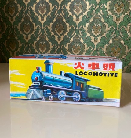 Locomotive blått blikktog 570 ST-1 med friksjonsmotor i original eske MF 712 China 1960-tallet